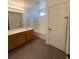 Bathroom featuring a double vanity, bathtub and shower combo, and neutral tiling at 5316 Fireside Ranch Ave, Las Vegas, NV 89131