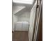 Laundry area with tile flooring, washer, dryer, and a bright white door at 5316 Fireside Ranch Ave, Las Vegas, NV 89131