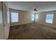 Spacious carpeted main bedroom features three windows for lots of natural light at 5316 Fireside Ranch Ave, Las Vegas, NV 89131