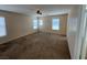 Expansive carpeted main bedroom with ceiling fan and plenty of natural light at 5316 Fireside Ranch Ave, Las Vegas, NV 89131