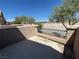 Private outdoor patio featuring a retaining wall and metal railing with views at 5316 Fireside Ranch Ave, Las Vegas, NV 89131
