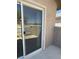 View of a sliding glass door leading to the balcony at 5316 Fireside Ranch Ave, Las Vegas, NV 89131