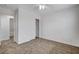 Bedroom features neutral carpet and a closet with sliding doors, providing ample storage at 5521 Jackpot Winner Ln # 101, Las Vegas, NV 89122