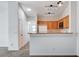 Modern kitchen featuring oak cabinets and updated appliances at 5521 Jackpot Winner Ln # 101, Las Vegas, NV 89122