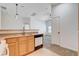 Open-concept kitchen includes sleek appliances and a convenient breakfast bar area at 5521 Jackpot Winner Ln # 101, Las Vegas, NV 89122