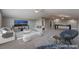 Spacious bonus room with comfortable seating, pool table and plenty of space to unwind at 5601 Mackenzie Park Ct, Las Vegas, NV 89130
