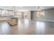 Bright and open living space featuring an island, modern decor, and dining area at 5601 Mackenzie Park Ct, Las Vegas, NV 89130