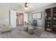Comfortable office space with modern desk, bookshelf, and ample natural light at 5601 Mackenzie Park Ct, Las Vegas, NV 89130