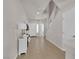 Inviting entry hall with tile floors, white wainscoting, and natural light at 5616 Canoe Ridge Ct, Las Vegas, NV 89141