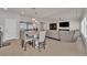 Open concept living and kitchen space with stainless appliances and large island at 5616 Canoe Ridge Ct, Las Vegas, NV 89141