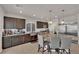 The spacious kitchen features stainless steel appliances, granite counters, and ample cabinet space at 5616 Canoe Ridge Ct, Las Vegas, NV 89141