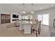 Modern kitchen with an island open to living room for seamless entertaining at 5616 Canoe Ridge Ct, Las Vegas, NV 89141