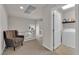Convenient laundry room with an upper shelf and a modern washer and dryer at 5616 Canoe Ridge Ct, Las Vegas, NV 89141