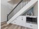 Living room area has a wet bar, staircase, and storage underneath at 6999 Montcliff Ave, Las Vegas, NV 89147