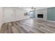 The home offers an open layout with updated floors, natural light, and a cozy fireplace feature at 6999 Montcliff Ave, Las Vegas, NV 89147