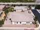 Aerial view of the home with a large backyard, privacy wall, and outdoor living space at 7230 Fresh Harvest Ave, Las Vegas, NV 89131