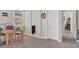 Sunlit bedroom with wooden furniture, neutral walls, and carpeted floor at 7230 Fresh Harvest Ave, Las Vegas, NV 89131