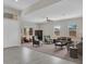 Inviting living room with plush seating, large windows, and neutral color palette at 7230 Fresh Harvest Ave, Las Vegas, NV 89131