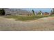 Expansive open field with distant mountains, ideal for outdoor activities and enjoying nature at 7230 Fresh Harvest Ave, Las Vegas, NV 89131
