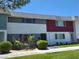 Two story townhouse with fresh paint and manicured yard at 745 Greenbriar Townhouse Way, Las Vegas, NV 89121