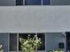 Exterior view of home showing windows and architectural details at 745 Greenbriar Townhouse Way, Las Vegas, NV 89121