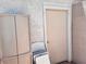 Exterior storage near door with patio furniture at 745 Greenbriar Townhouse Way, Las Vegas, NV 89121