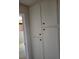 Hallway features a built-in closet at 745 Greenbriar Townhouse Way, Las Vegas, NV 89121
