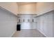 Walk-in closet with multiple shelves, hanging rods, and carpeted floors for organized storage at 8204 Turbys Treehouse Pl, Las Vegas, NV 89131