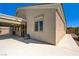 Exterior view of the house highlighting the covered patio and side yard access at 8204 Turbys Treehouse Pl, Las Vegas, NV 89131