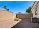 Low-maintenance side yard with gravel and privacy fencing at 8204 Turbys Treehouse Pl, Las Vegas, NV 89131