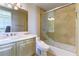 Updated bathroom features a tile shower, tub, toilet, and updated vanity at 9101 Alta Dr # 301, Las Vegas, NV 89145