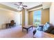 Bright bedroom with large windows offering city views and a cozy seating area at 9101 Alta Dr # 301, Las Vegas, NV 89145
