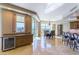 Bright dining area with a wine fridge and city views at 9101 Alta Dr # 301, Las Vegas, NV 89145