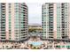 Upscale condo towers framing a pristine pool area, offering a resort-style living experience at 9101 Alta Dr # 301, Las Vegas, NV 89145