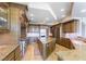 Spacious kitchen with custom cabinetry, large island, and stainless steel appliances at 9101 Alta Dr # 301, Las Vegas, NV 89145