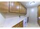 Spacious laundry room with a countertop, cabinets, and washer and dryer at 9101 Alta Dr # 301, Las Vegas, NV 89145