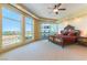 Luxury main bedroom featuring large windows showcasing views, a private balcony, and a decorative furniture set at 9101 Alta Dr # 301, Las Vegas, NV 89145