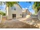 Spacious backyard featuring a block fence, slider door, and potential for landscaping or outdoor living at 9507 Brewing Cloud Ave, Las Vegas, NV 89148