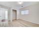 Bright bedroom features light wood floors, closet with sliding doors, and natural light from the window at 9507 Brewing Cloud Ave, Las Vegas, NV 89148
