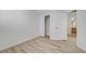 This bedroom features wood-look floors and a closet at 9507 Brewing Cloud Ave, Las Vegas, NV 89148