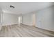 Large bedroom with hardwood floors and plenty of natural light from multiple windows at 9507 Brewing Cloud Ave, Las Vegas, NV 89148