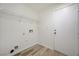 This laundry room includes a door to the exterior at 9507 Brewing Cloud Ave, Las Vegas, NV 89148