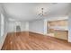 Inviting living room with hardwood floors, an open concept and filled with ample natural light at 9507 Brewing Cloud Ave, Las Vegas, NV 89148