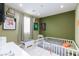 Cozy bedroom with a basketball theme featuring sports memorabilia on the wall and neutral tones at 10095 Ferton Lake Ave, Las Vegas, NV 89178