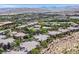 Community aerial view showcasing the neighborhood's layout and surrounding amenities and mountain landscape at 10640 Amber Ridge Dr # 101, Las Vegas, NV 89144