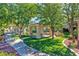 Outdoor community area featuring covered seating, bbq grills, and well-maintained landscaping at 10640 Amber Ridge Dr # 101, Las Vegas, NV 89144