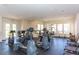 Well-equipped gym with treadmills, weights, and plenty of natural light at 10640 Amber Ridge Dr # 101, Las Vegas, NV 89144
