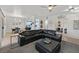 Living room with an open floor plan leading to the dining area and kitchen at 10640 Amber Ridge Dr # 101, Las Vegas, NV 89144