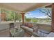 Outdoor patio with comfortable seating and views of the mountains at 10640 Amber Ridge Dr # 101, Las Vegas, NV 89144