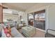 Relaxing patio with comfortable seating and a sliding glass door to enjoy the view at 10640 Amber Ridge Dr # 101, Las Vegas, NV 89144